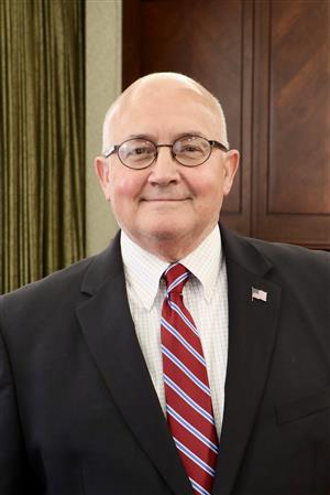 Mr. Ted Poore