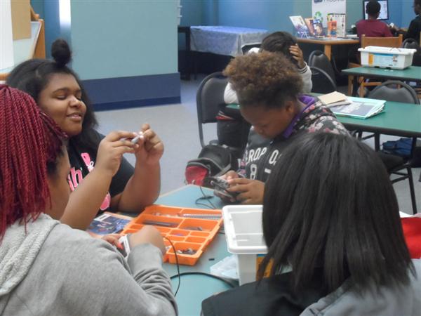 Students Working on Robots in Lab