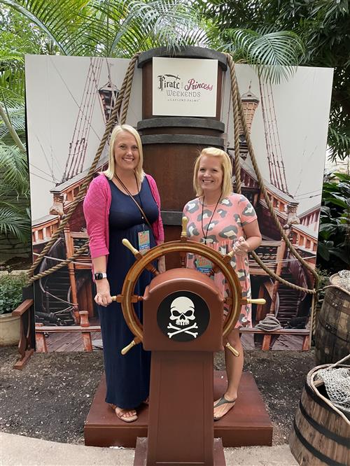 Mrs. Henry and Mrs. Arnold with a pirate wheel